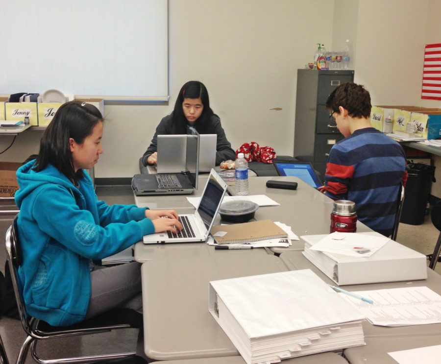 Team+members+Joye+Yang+%28left%29%2C+Jenny+Chieu+%28middle%29%2C+and+David+Mnitsa+%28right%29+practive+writing+their+essays.