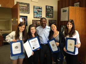 Seniors Julia Waldow, Natalie Gordon, principal Carter Paysinger, senior Eva Zheng and ------ accept their certificates from Rep. Richard Bloom.