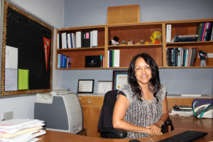 Assistant Principal Renne Cobb, works from her desk at House A 