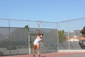 Bocchi sends her serve to her opponent. Photo by: KAREN SHILYAN. 