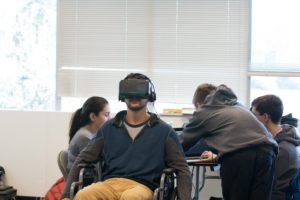 Students at Hack GenY test their virtual wheelchair simulator, which won third place 