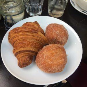 Republique's freshly baked butter croissant and vanilla beingets. Photo by: JULIETTE DEUTSCH