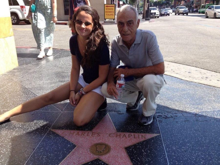 Di Battista with her grandfather, Oswaldo Gonzalez, at the Hollywood Walk of Fame in 2012.