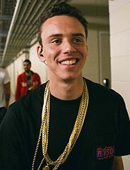 Logic attempts to stave off the lyrical embers forming in his throat before he spits fire at a 2014 concert in Orlando.
Photo reused with permission from Nick Mahar (Creative Commons).