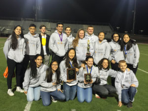 Science Olympiad members celebrate with their awards following the Regional competition. Photo courtesy of: JAMIE KIM.