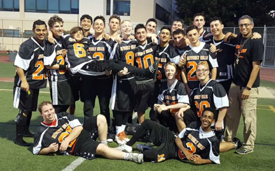 Boys varsity lacrosse poses for a picture after their last game of the season. PHOTO COURTESY OF: JASON HARWARD