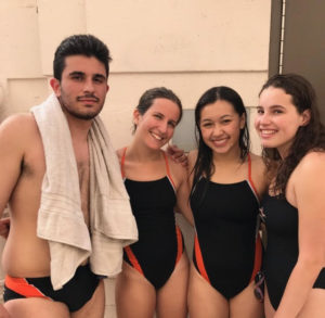 Seniors Josh Fouladian, Veronica Karlin, Hannah Knecht and Sara Okum pose together, celebrating their years on swim.