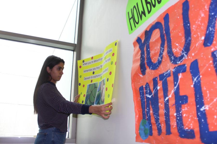 Freshman Parnya Danesh takes down one of her campaign posters after losing the position for sophomore vice president. Danesh felt that she put in a lot effort into her campaign and wouldn’t have done anything differently because she did her best. Photo by: Dayeon Jeong