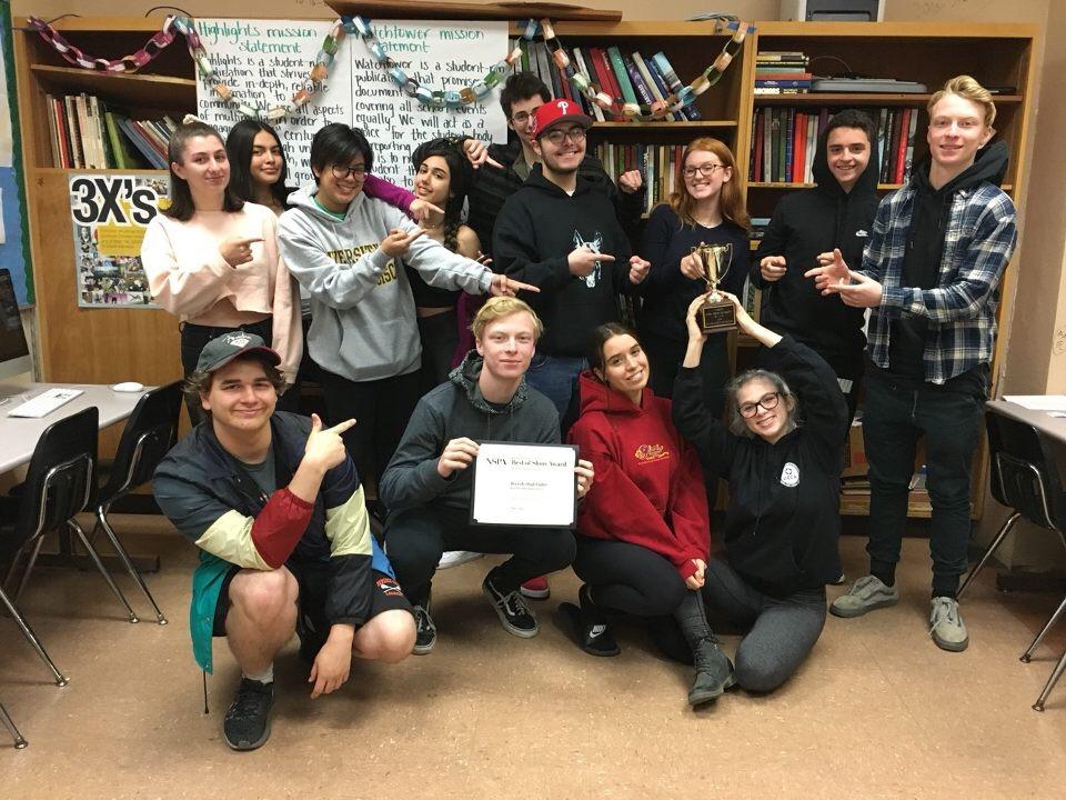 The staff of Beverly Highlights pose with their Best of Show award certificate and trophy. 