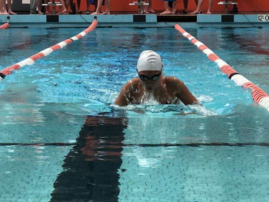 Varsity swim ends league with a splash