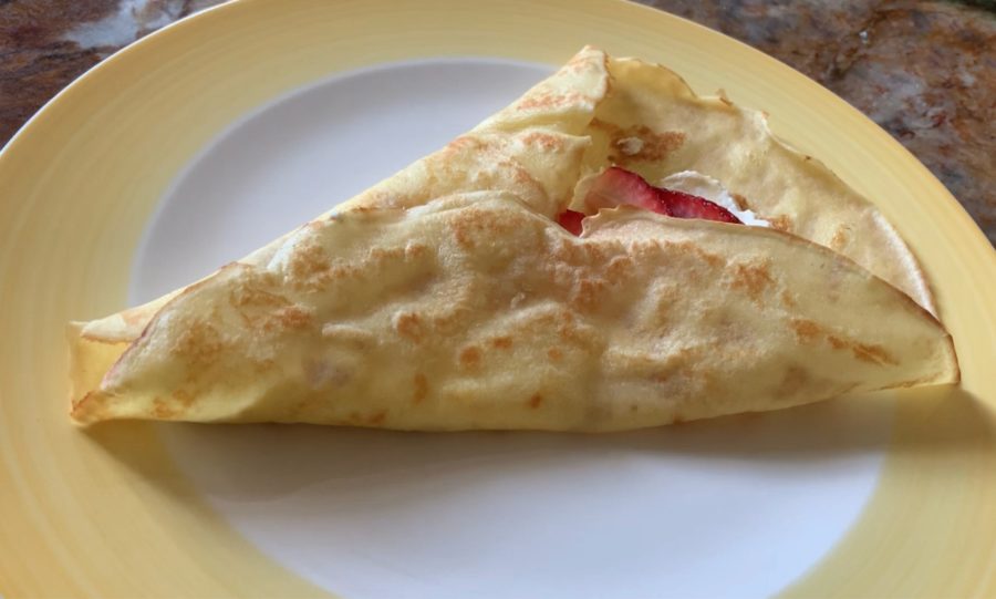 Photo of completed ricotta, honey, strawberry and lemon crepe