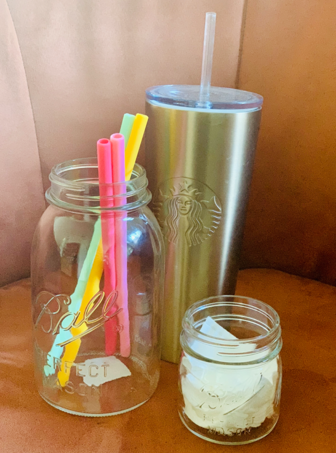 Photo of reusable cotton rounds, silicone straws, and reusable Starbucks cup