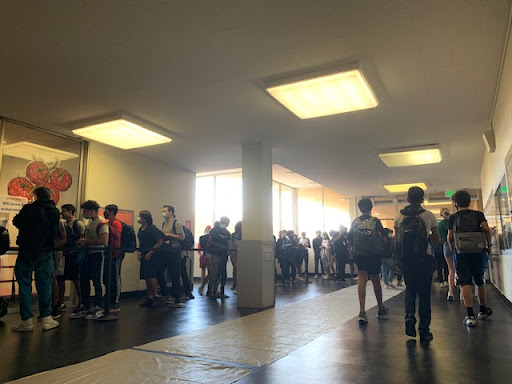 Students wait in line to go into the cafeteria. “I love that the lunches are free now since it speeds up the process of getting my lunch,” senior Jennifer Li said. 