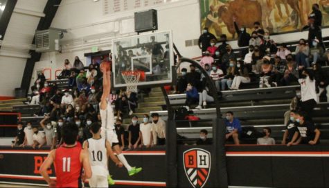 Forward senior Jac Mani attempts to make a dunk during the game against Oakwood. Mani recently committed to UC Davis and he inked a National Letter of Intent on Nov.11
Photo by: Ryo Miyake
