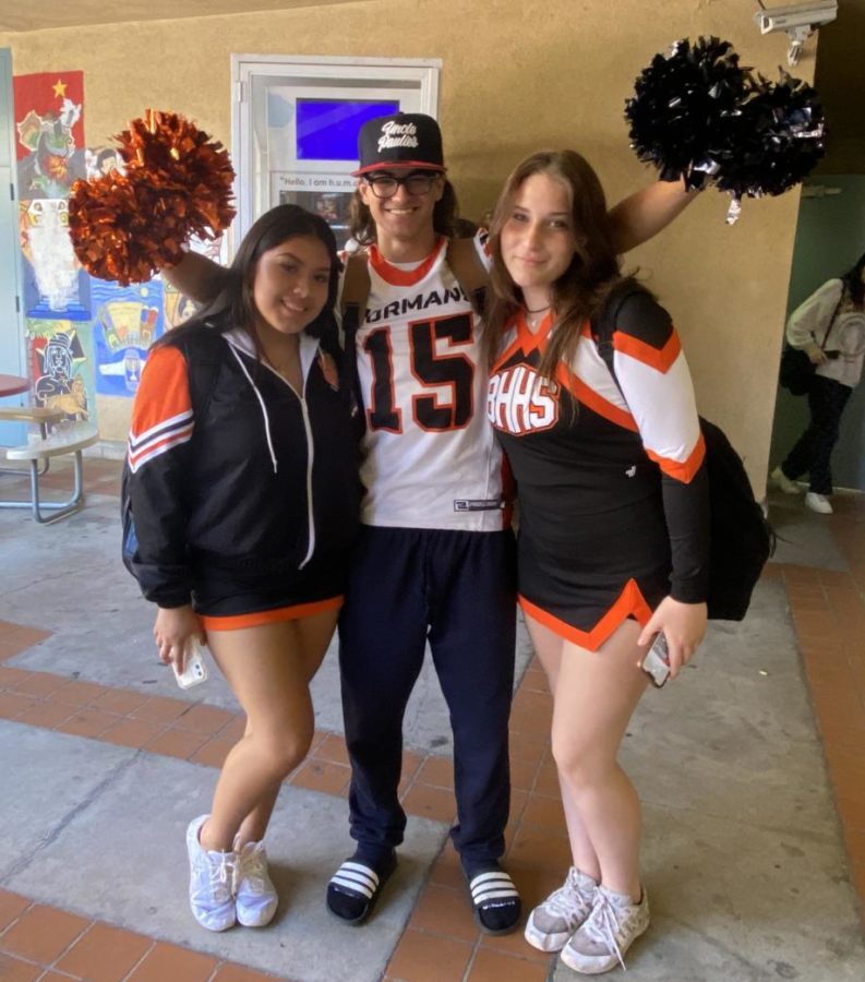 Juniors+Jesse+Jenco+and+Madison+Mayo+and+senior+Cintya+Molina+show+up+to+Game+Day+in+their+Beverly+football+and+cheer+uniforms.+%0APhoto+by%3A+Shayda+Dadvand%0A