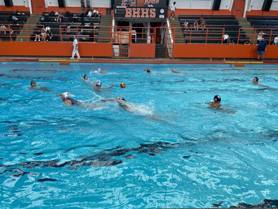Boys+varsity+water+polo+team+plays+against+Milken+Community+School.+%E2%80%9CI+used+to+be+nervous+before+games.+I%E2%80%99d+be+nervous+to+make+mistakes+during+the+game%2C+but+now+I+keep+in+a+state+of+mind+where+I%E2%80%99m+calm+but+at+the+same+time+I%E2%80%99m+ready+to+play+physically+and+bring+that+aggressive+mindset+to+the+game%2C%E2%80%9D+Varsity+Co-Captain+Givi+Mchedlishvili+said.%0APhoto+by%3A+Shayda+Dadvand%0A