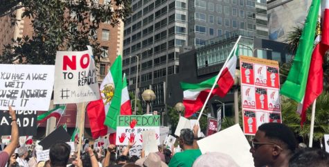 People gather in downtown LA to rally for freedom in Iran. 