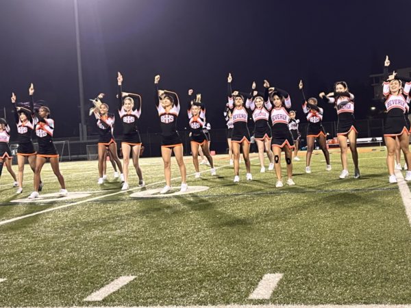 Cheer performs at halftime during the first home football game.