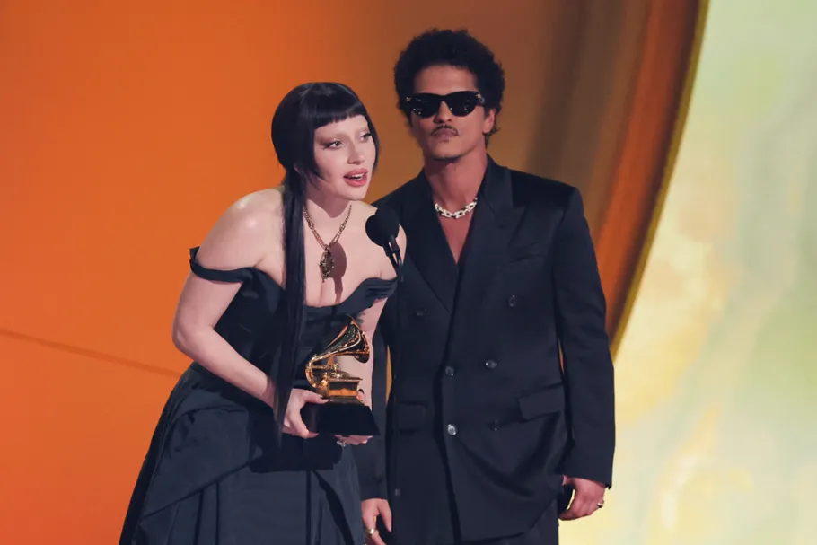 Lady Gaga and Bruno Mars speak as they receive their Grammy,