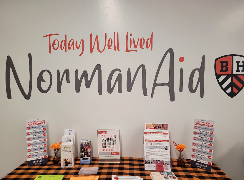 NormanAid offers flyers in front of their room to promote mental health awareness. 