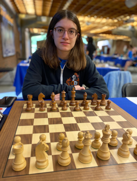 Senior Chloe Zamojski gets ready for a chess match.