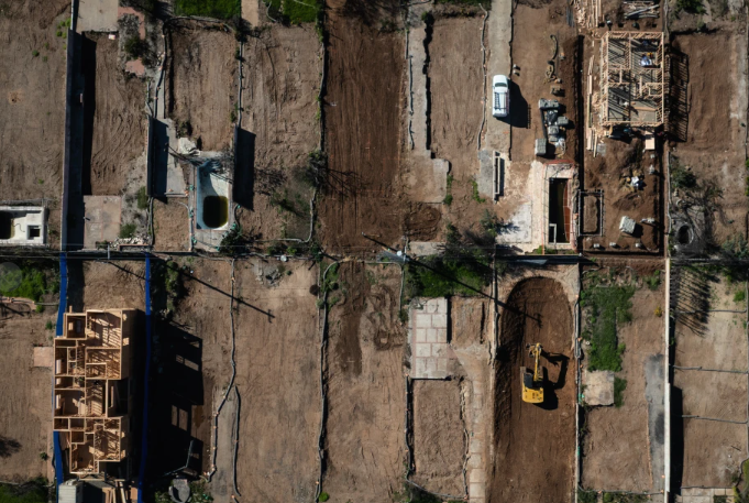 Aerial view of houses being rebuilt in the Palisades area.