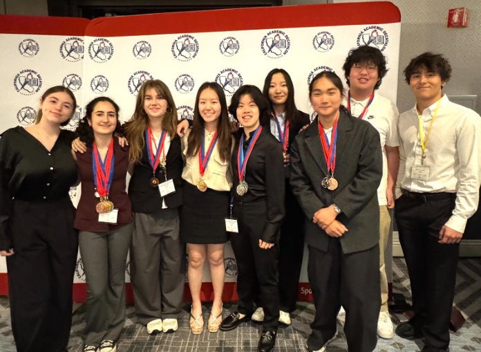 Beverly’s team poses for a photo after the awards ceremony (Mrs. Fine)

